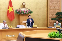 Thủ tướng Phạm Minh Chính chủ trì cuộc họp Chính phủ chuyên đề về việc sắp xếp, tổ chức lại đơn vị hành chính các cấp. (Ảnh: Dương Giang/TTXVN)