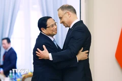 Thủ tướng Phạm Minh Chính hội kiến Tổng thống Ba Lan Andrzej Duda. (Ảnh: Dương Giang/TTXVN)