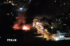 Vụ hỏa hoạn nhìn từ trên cao. (Ảnh TTXVN phát)