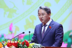 Đồng chí Nguyễn Hải Ninh, Ủy viên Trung ương Đảng, Ủy viên Ban Chấp hành Đảng bộ Chính phủ, Bí thư Đảng ủy, Bộ trưởng Bộ Tư pháp trình bày tham luận tại Đại hội. (Ảnh: Văn Điệp/TTXVN)