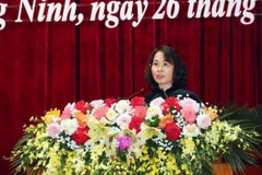 Chủ tịch HĐND tỉnh Quảng Ninh Trịnh Thị Minh Thanh phát biểu tại kỳ họp. (Ảnh: Văn Đức/TTXVN)