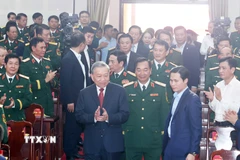 Tổng Bí thư Tô Lâm dự Lễ kỷ niệm 80 năm Ngày truyền thống lực lượng vũ trang Quân khu 1. (Ảnh: Thống Nhất/TTXVN)