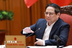 Thủ tướng Phạm Minh Chính, Bí thư Đảng ủy Chính phủ chủ trì cuộc họp. (Ảnh: Dương Giang/TTXVN)
