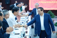 Thủ tướng Phạm Minh Chính làm việc với Ban Thường vụ Thành uỷ Đà Nẵng về tình hình phát triển kinh tế-xã hội. (Ảnh: Dương Giang/TTXVN)