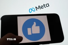 Biểu tượng Facebook và Meta. (Ảnh: AFP/TTXVN)