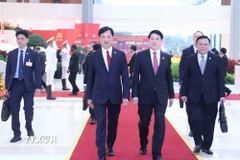 Chủ tịch nước Lương Cường và Bí thư Thành ủy Hà Nội Nguyễn Duy Ngọc đến dự khai mạc Đại hội. (Ảnh: TTXVN)