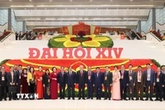 Các đại biểu dự phiên khai mạc Đại hội chụp ảnh lưu niệm. (Ảnh: TTXVN)