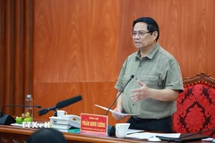 Thủ tướng Phạm Minh Chính làm việc với lãnh đạo các tỉnh: Đắk Lắk, Gia Lai, Khánh Hòa, Lâm Đồng để triển khai các biện pháp khắc phục hậu quả mưa lũ, ổn định đời sống nhân dân. (Ảnh: Dương Giang/TTXVN)