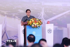 Thủ tướng Phạm Minh Chính phát biểu tại lễ khởi công Dự án đầu tư xây dựng cầu Tứ Liên. (Ảnh: Dương Giang/TTXVN)