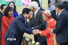 Thủ tướng Phạm Minh Chính với các đại biểu dự Đại hội. (Ảnh: Dương Giang/TTXVN)