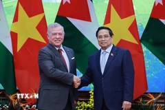 Thủ tướng Phạm Minh Chính hội kiến Quốc vương Jordan Abdullah II Ibn Al Hussein. (Ảnh: Dương Giang/TTXVN)