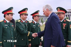 Bí thư Thứ nhất, Chủ tịch nước Cuba Miguel Díaz-Canel Bermúdez với các đại biểu. (Ảnh: Văn Điệp/TTXVN)