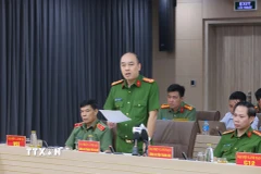 Đại tá Nguyễn Đức Long, Phó Giám đốc Công an thành phố Hà Nội trả lời câu hỏi của phóng viên các cơ quan thông tấn, báo chí. (Ảnh: Phạm Kiên/TTXVN)
