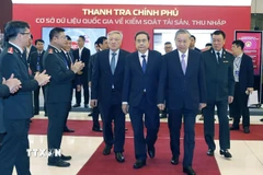 Tổng Bí thư Tô Lâm, Chủ tịch Quốc hội Trần Thanh Mẫn cùng các lãnh đạo Đảng, Nhà nước đến dự Lễ kỷ niệm 80 năm Ngày truyền thống Thanh tra Việt Nam (23/11/1945 - 23/11/2025). (Ảnh: Thống Nhất/TTXVN)