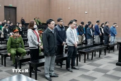 Các bị cáo tại phiên tòa ngày 27/12/2024. (Ảnh: Kim Anh/TTXVN)