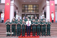 Tổng Bí thư Tô Lâm cùng các lãnh đạo Quân ủy Trung ương, Bộ Quốc phòng, Tổng cục Chính trị Quân đội nhân dân Việt Nam. (Ảnh: Thống Nhất/TTXVN)