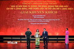 Tác giả Đỗ Minh Thu - Báo điện tử VietnamPlus (TTXVN) đoạt giải Khuyến khích. (Ảnh: Phạm Tuấn Anh/TTXVN)