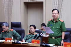 Thiếu tướng Lê Văn Tân, Phó Chánh Văn phòng Bộ Công an trả lời câu hỏi của các cơ quan thông tấn, báo chí. (Ảnh: Tuấn Anh/TTXVN)