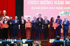 Thủ tướng Phạm Minh Chính chúc Tết Bộ Văn hóa, Thể thao và Du lịch. (Ảnh: Dương Giang/TTXVN)