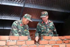 Lực lượng Ban Chỉ huy phòng thủ khu vực 1 Sơn Tịnh (Quảng Ngãi) tham gia Chiến dịch Quang Trung. (Ảnh: Cao Nguyên/TTXVN)