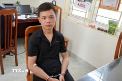 Đối tượng Nguyễn Ngọc Đạo bị khởi về các tội “Giết người”, “Cướp tài sản” và “Tàng trữ, sử dụng trái phép vũ khí quân dụng”. (Ảnh: TTXVN phát)