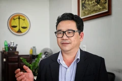 Giám đốc Hợp tác xã Organic, phường Bắc Giang (Bắc Ninh), Lưu Đình Hợp, góp ý vào dự thảo. (Ảnh: Danh Lam/TTXVN)