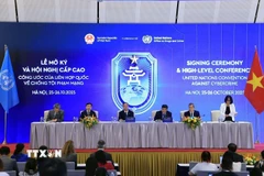 Quang cảnh buổi họp báo quốc tế thông báo kết quả Lễ mở ký Công ước Hà Nội. (Ảnh: Tuấn Anh/TTXVN)