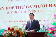 Tân Chủ tịch UBND tỉnh Lai Châu, đồng chí Hà Quang Trung phát biểu nhận nhiệm vụ. *Ảnh: Quý Trung/TTXVN)