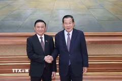 Thường trực Ban Bí thư Trần Cẩm Tú và Chủ tịch CPP, Chủ tịch Thượng viện Campuchia Hun Sen. (Ảnh: Phương Hoa/TTXVN)
