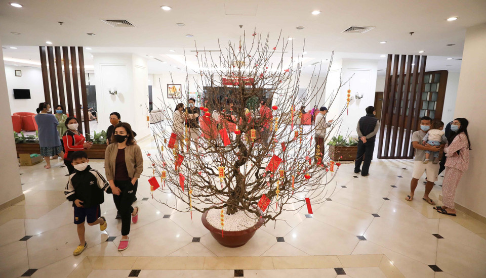 Nhiều người dân lo ngại lệnh phong tỏa sẽ khiến họ "mất Tết"(Ảnh: Thanh Tùng/TTXVN)