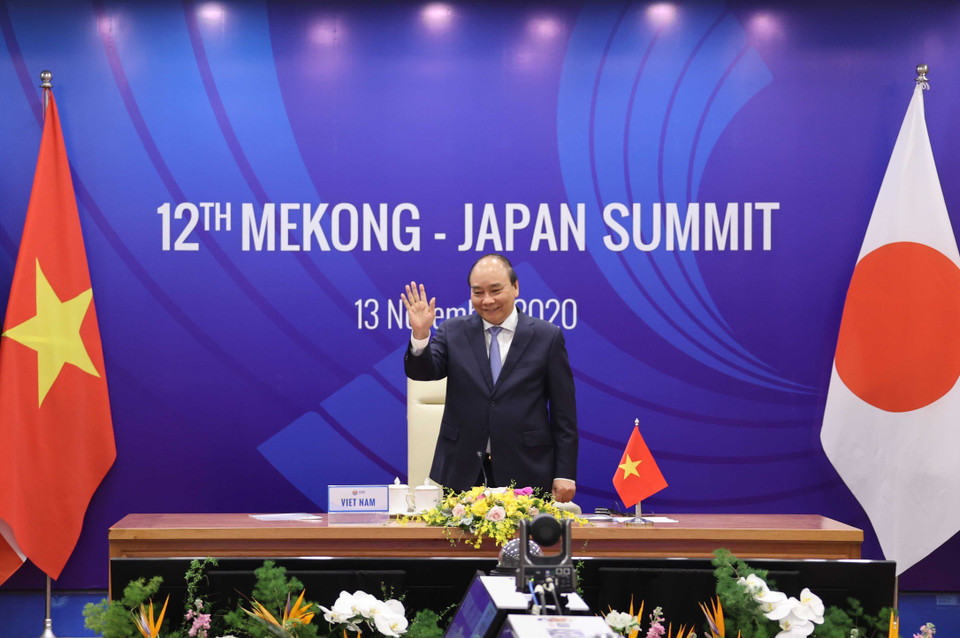 Thủ tướng Nguyễn Xuân Phúc chào lãnh đạo các nước ASEAN, Nhật Bản và các đại biểu dự Hội nghị Cấp cao Mekong-Nhật Bản Bản lần thứ 12 theo hình thức trực tuyến. (Ảnh: Dương Giang/TTXVN)