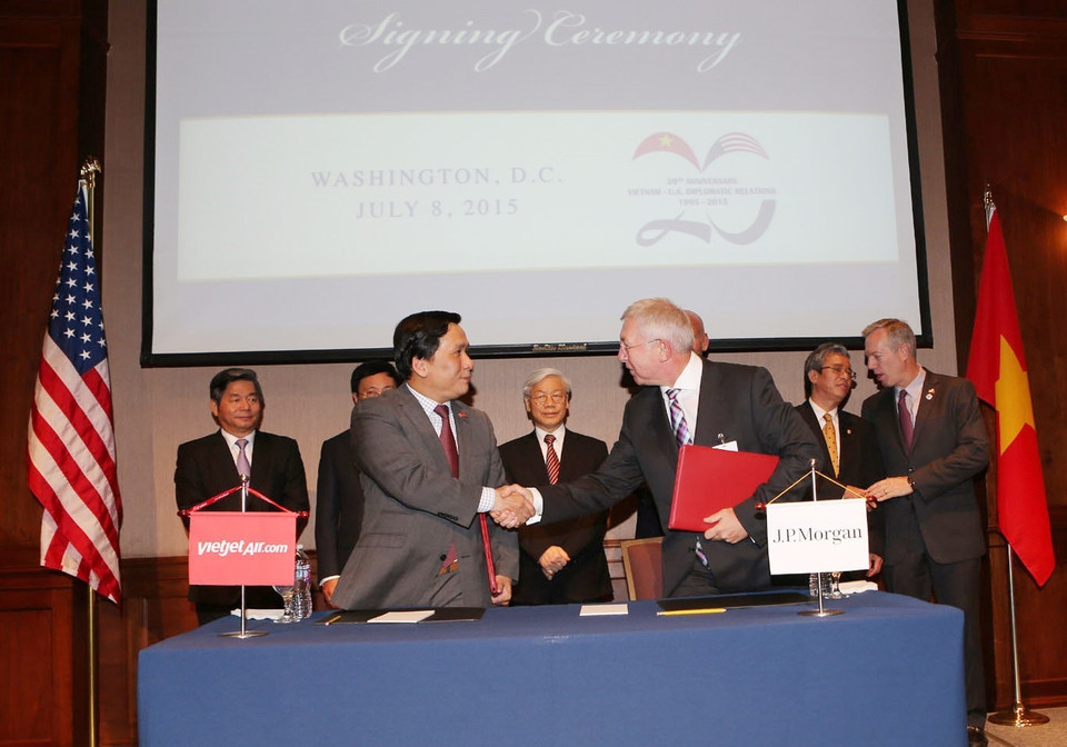 Lễ ký Bản ghi nhớ giữa Hãng hàng không VietjetAir (Việt Nam) và Công ty JP Morgan về tài trợ tín dụng xuất khẩu cho việc mua tàu bay mới của VietjetAir, chiều 8/7/2015, nhân chuyến thăm chính thức Hoa Kỳ của Tổng Bí thư Nguyễn Phú Trọng. (Ảnh: Trí Dũng/TTXVN)