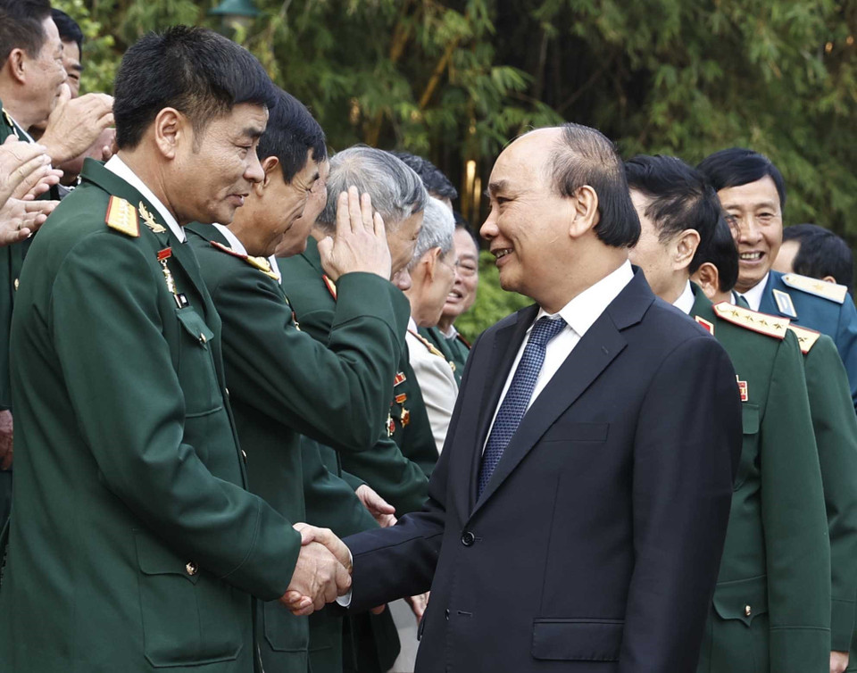 Chủ tịch nước với các cựu chiến binh Sư đoàn 341. (Ảnh: Thống Nhất/TTXVN)