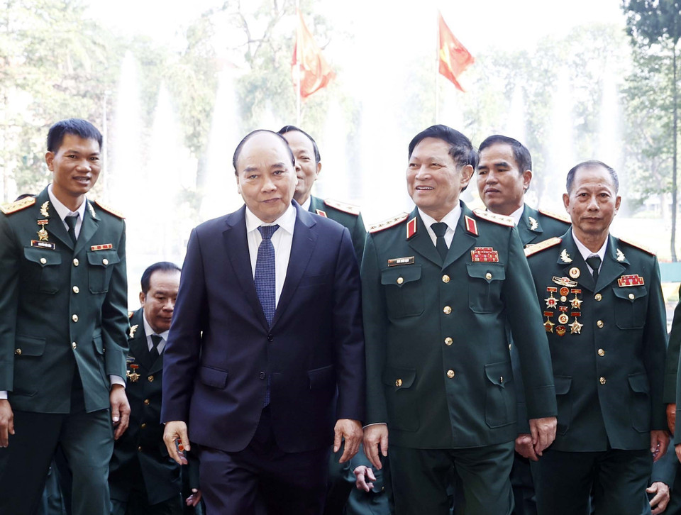 Chủ tịch nước với các cựu chiến binh Sư đoàn 341. (Ảnh: Thống Nhất/TTXVN)