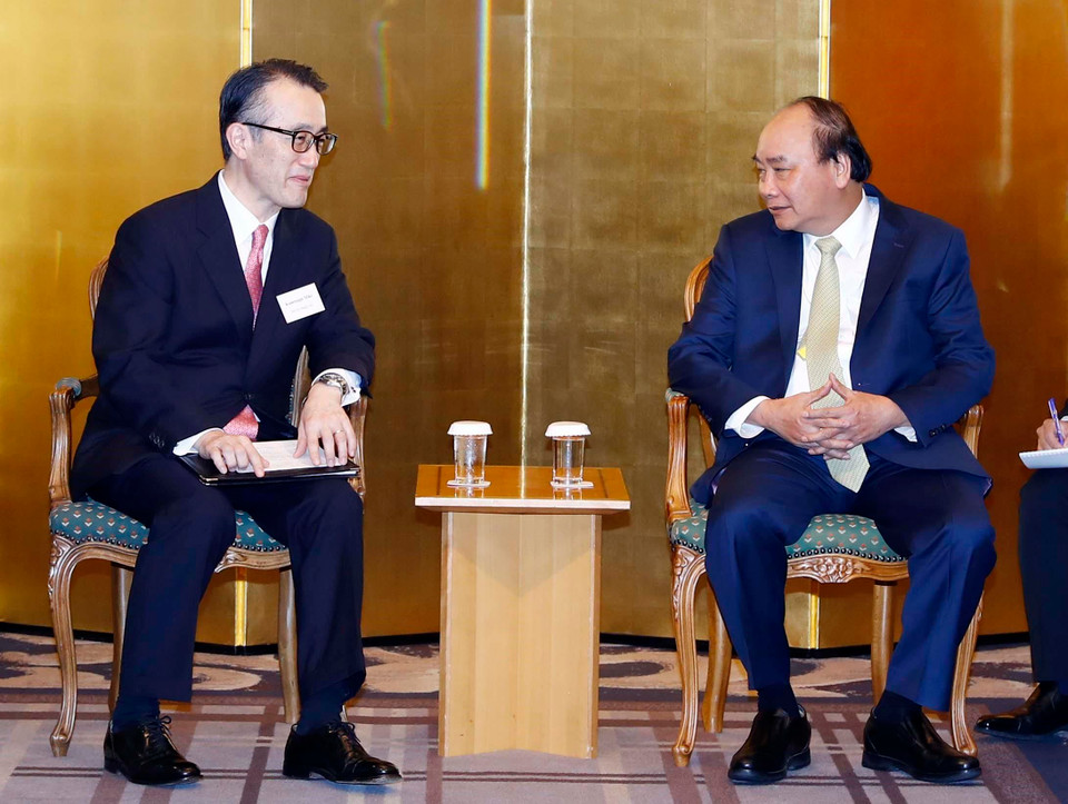 Thủ tướng Nguyễn Xuân Phúc tiếp Chủ tịch Ngân hàng MUFG (Nhật Bản) Kanetsugu Mike. (Ảnh: Thống Nhất/TTXVN)