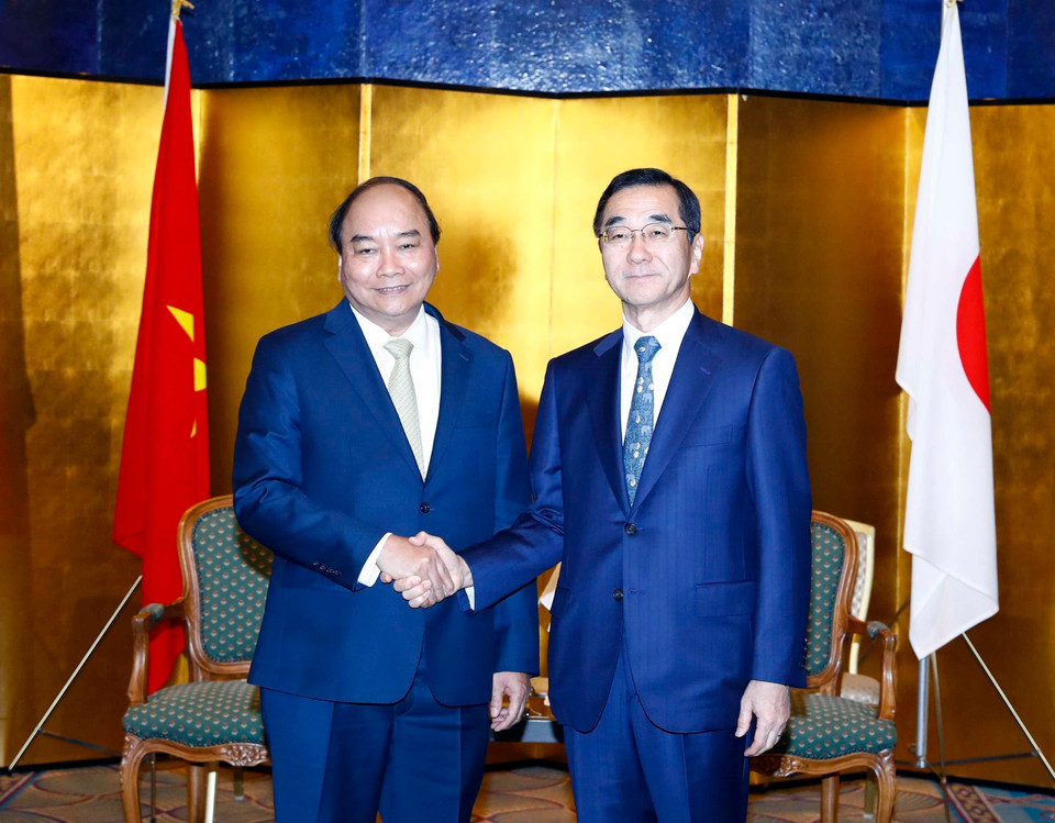 Thủ tướng Nguyễn Xuân Phúc tiếp Chủ tịch Tổ chức Xúc tiến Thương mại Nhật Bản (JETRO) Nobuhiko Sasaki. (Ảnh: Thống Nhất/TTXVN)