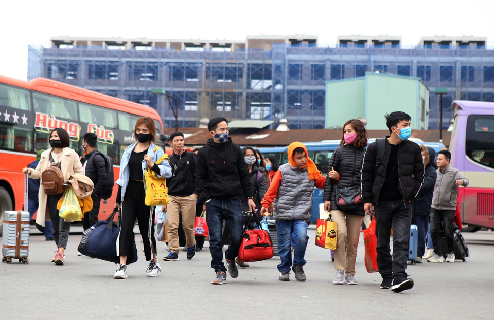 Người dân trở về sau kỳ nghỉ tết. (Ảnh: Danh Lam/TTXVN)