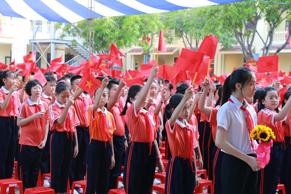 Không khí vui tươi tại lễ khai giảng năm học mới của học sinh trường THCS Hà Huy Tập, thành phố Vinh, tỉnh Nghệ An. (Ảnh: Bích Huệ/TTXVN)