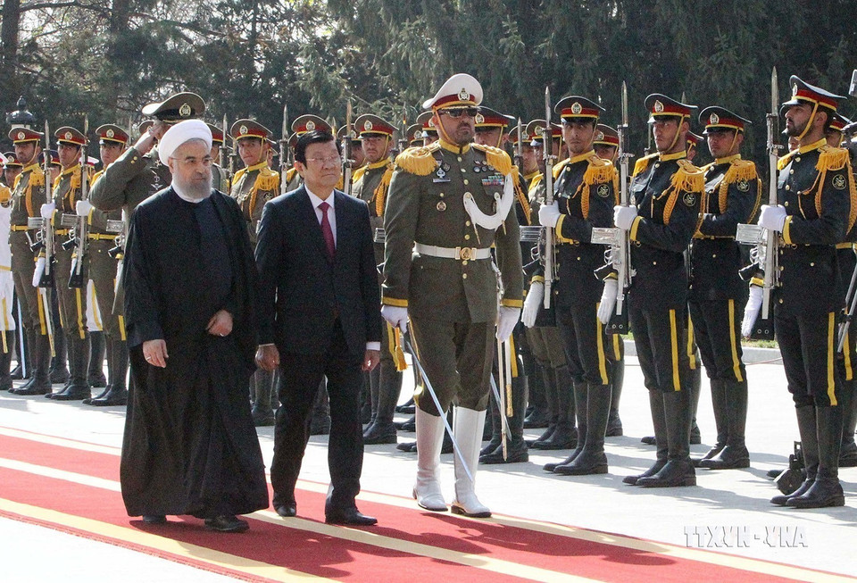 Tổng thống Iran Hassan Rouhani chủ trì Lễ đón Chủ tịch nước Trương Tấn Sang thăm cấp Nhà nước Cộng hòa Hồi giáo Iran (Tehran, 14/3/2016). (Ảnh: Nguyễn Khang/TTXVN)