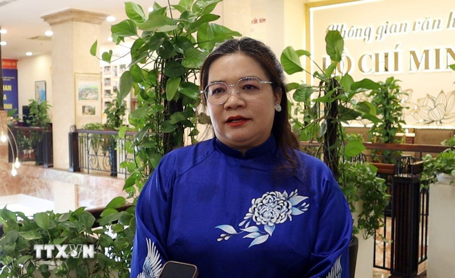 Bà Lâm Thúy Ái, Tổng Giám đốc Công ty cổ phần Mebi Farm, đóng góp ý kiến vào dự thảo văn kiện. (Ảnh: Xuân Anh/TTXVN) ttxvn-gop-y-du-thao3.jpg