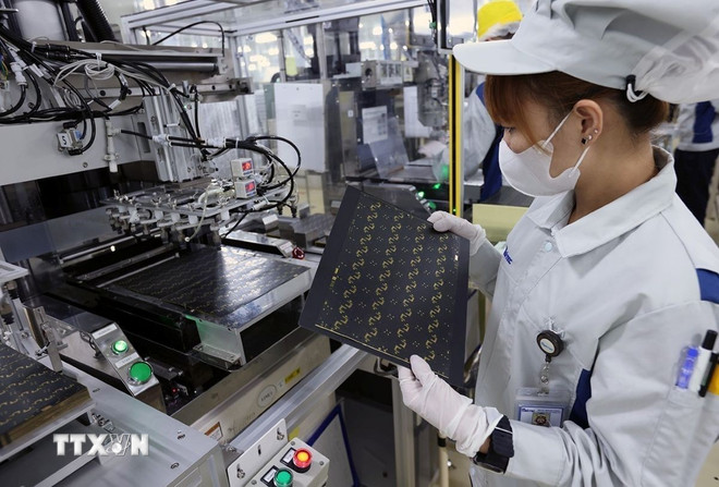 (写真:ヴー・シン/VNA) ttxvn-cong-nghiep.jpg
