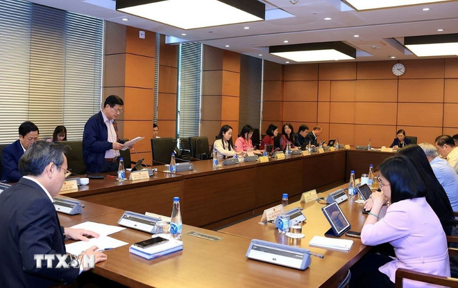 Os delegados discutiram no grupo 4, que incluía as províncias de Khanh Hoa, Lao Cai e Lai Chau. (Foto: Tuan Anh/VNA) ttxvn-chuyen-doi-so2.jpg