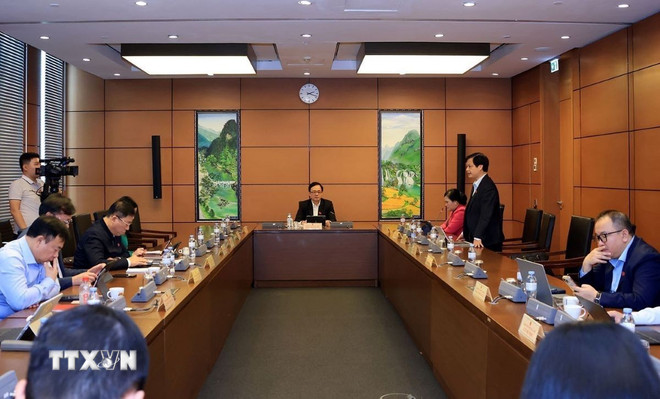 Os delegados discutiram no grupo 6, que incluía as províncias de Dong Nai e Lang Son e a cidade de Hue. (Foto: Tuan Anh/VNA) ttxvn-chuyen-doi-so3.jpg