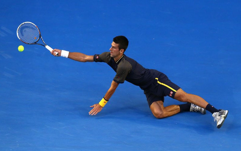 Novak Djokovic cứu bóng trong trận thắng Andy Murray và đoạt chức vô địch Australian Open. (Nguồn: Getty Images)