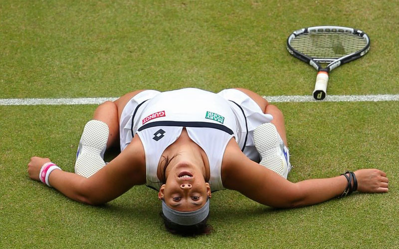 Marion Bartoli 'phát cuồng' sau khi đánh bại Kirsten Flipkens ở bán kết, trước khi hạ Sabine Lisicki ở chung kết Wimbledon. (Nguồn: Getty Images)