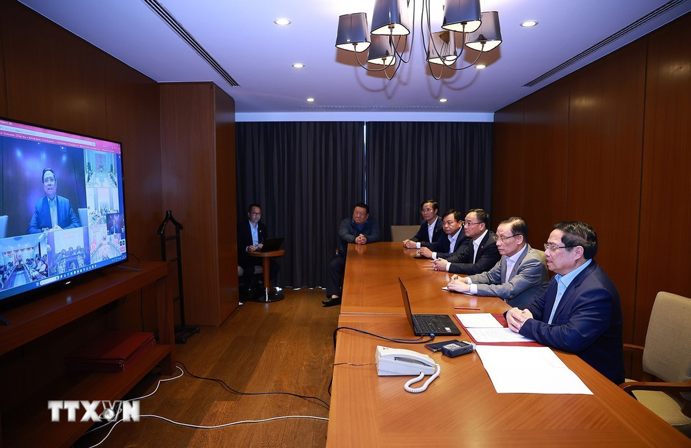 Thủ tướng Phạm Minh Chính họp trực tuyến đến các tỉnh, thành phố trong nước để triển khai các phương án cứu hộ, cứu nạn và khắc phục hậu quả thiên tai. (Ảnh: Dương Giang/TTXVN)