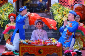Một hoạt động văn hóa trong Lễ khai hội truyền thống và đón Bằng xếp hạng di tích quốc gia đặc biệt Thăng Long tứ trấn - đền Kim Liên năm 2022. (Ảnh: Văn Điệp/TTXVN)