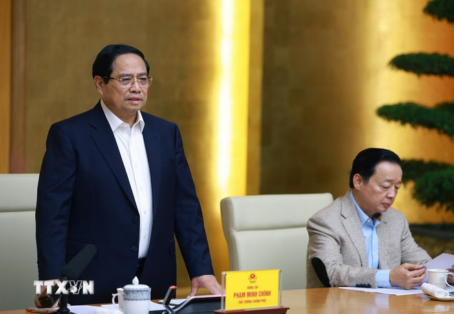 ראש הממשלה פאם מין צ'ין עמד בראש פגישה להשקת ttxvn-0912-thu-tuong-xay-nha-vung-lu-3.jpg