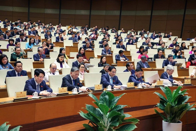 Đại biểu Quốc hội biểu quyết thông qua Luật Dữ liệu. (Ảnh: Văn Điệp/TTXVN) 0107-luat-du-lieu.jpg