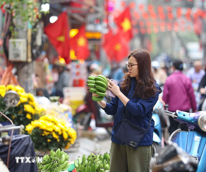 ttxvn-1502-ha-noi-cho-truyen-thong-ngay-cuoi-nam-10.jpg